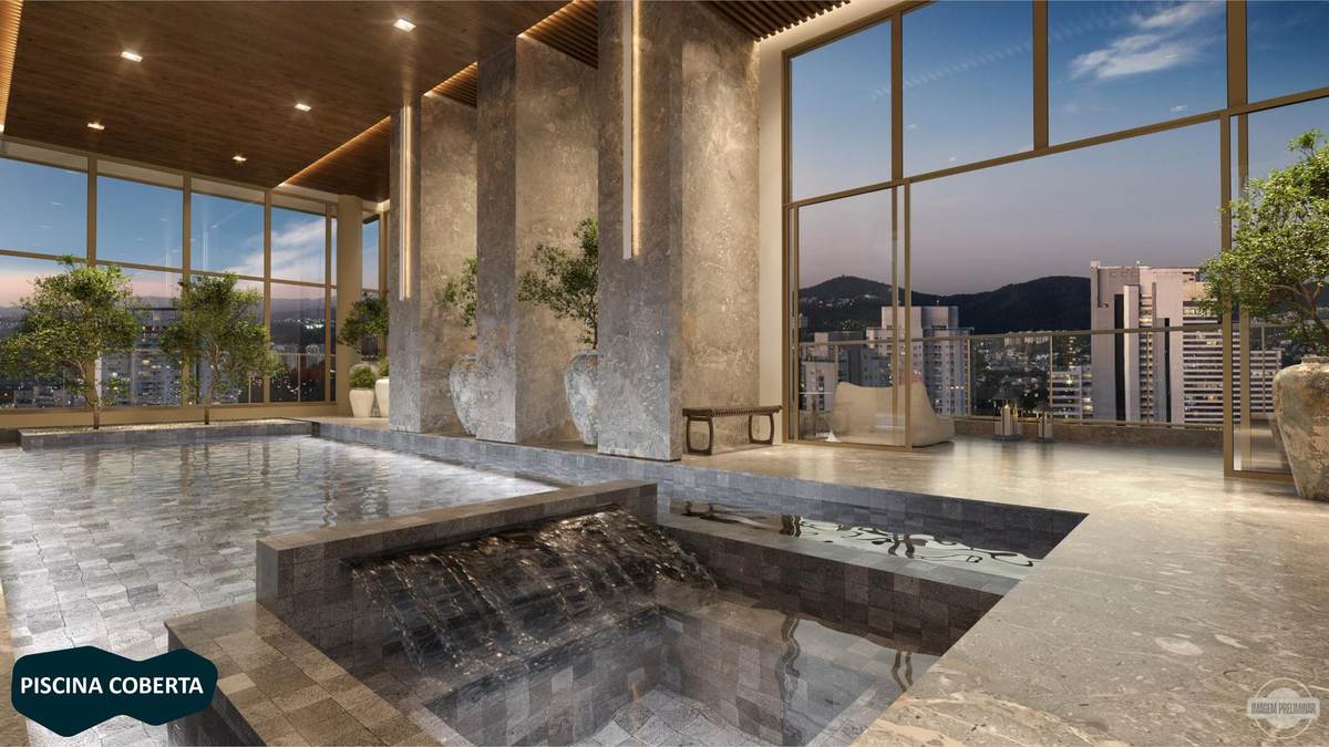 Piscina coberta no 20º andar com cascata, ofurô e vista panorâmica de Alphaville à noite