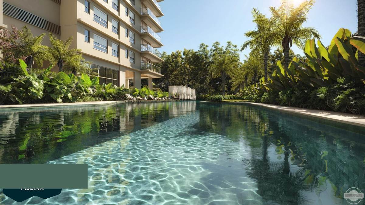 Piscina aquecida do KA'A Home Boutique com palmeiras e mata ao fundo — AlphaGran, Alphaville
