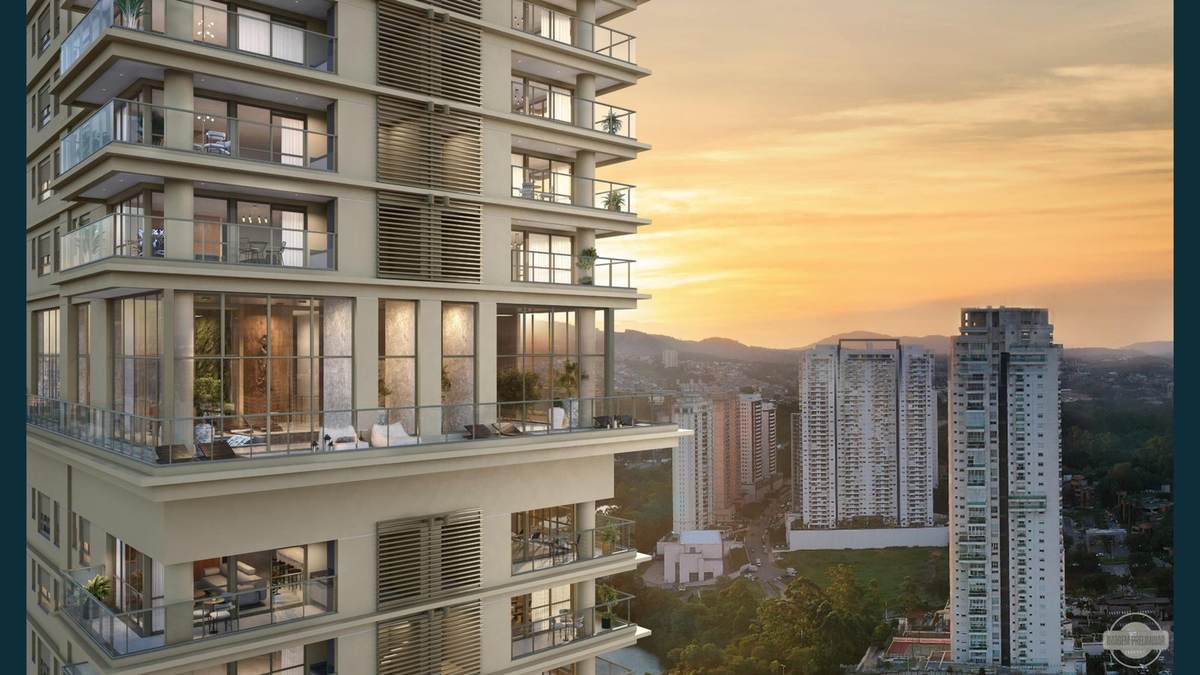 Vista aérea ao entardecer das varandas do KA'A Home Boutique com skyline de Alphaville ao fundo