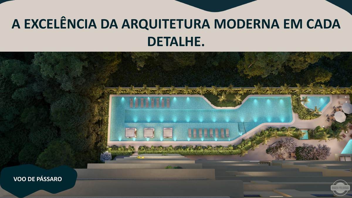 Vista aérea noturna da piscina do KA'A Home Boutique cercada pela mata do AlphaGran